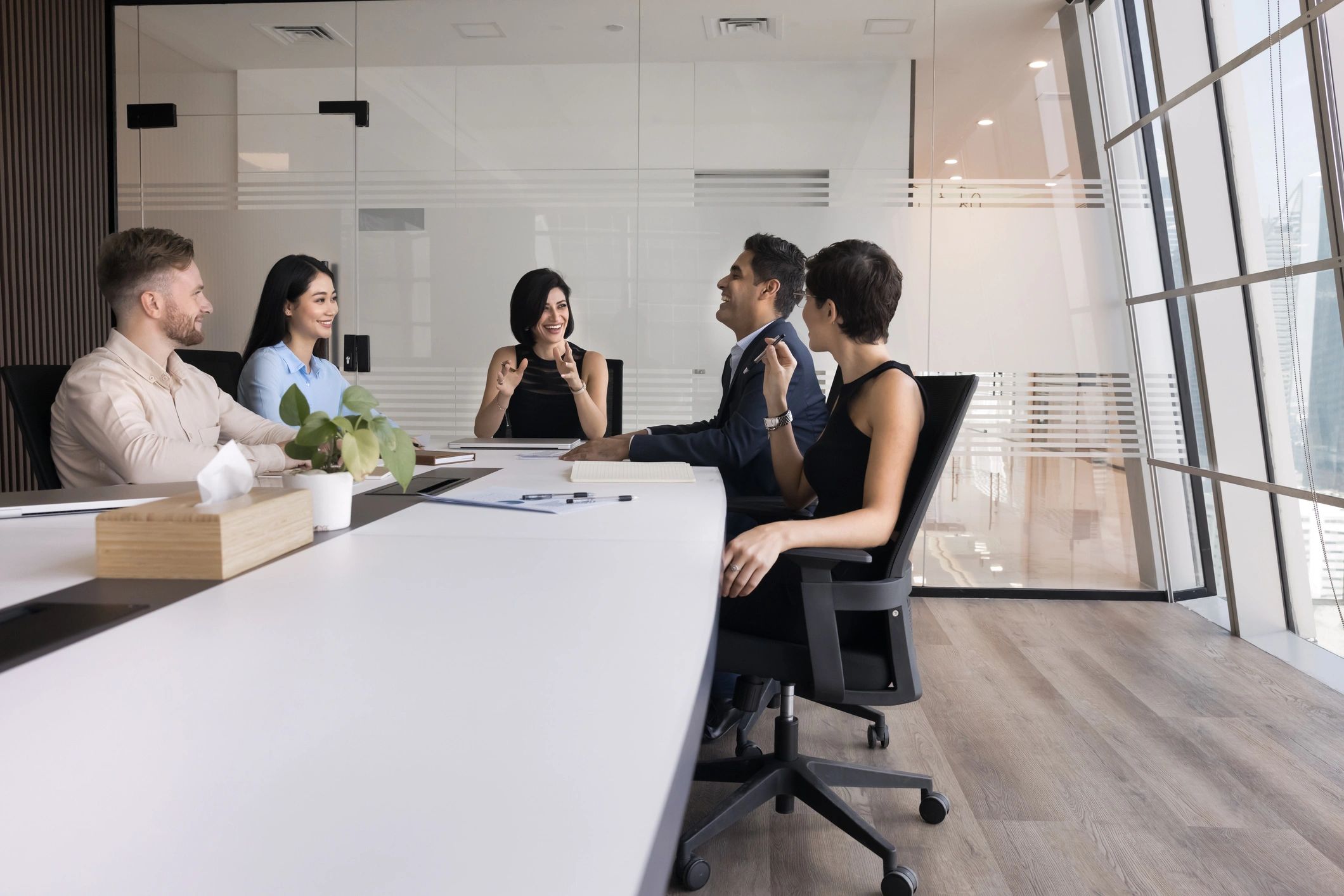 Home Professional business team meeting in a modern office